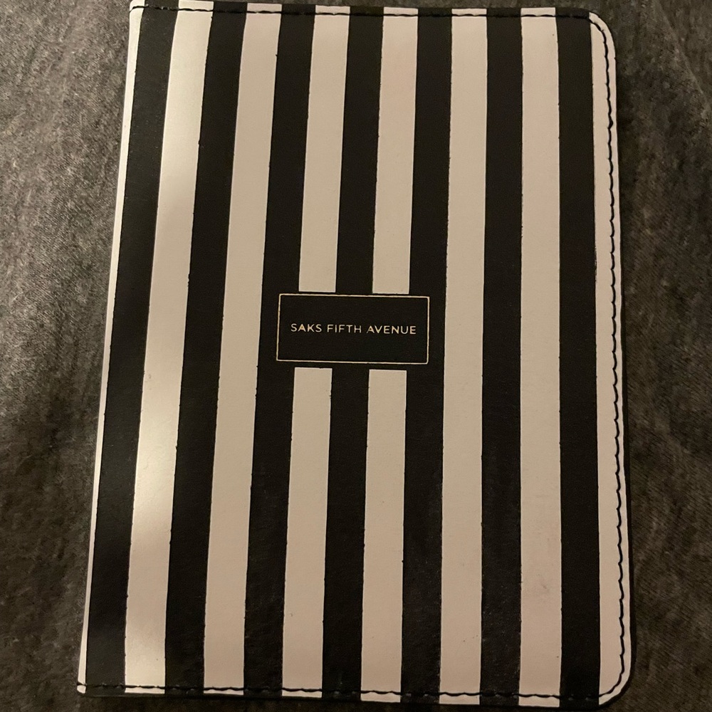 Saks Fifth Avenue Wallet. In amazing shape. Used a couple of times.